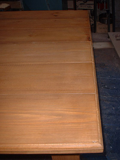 Close up of the corner large pine table