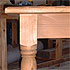 Close-up detail of a large pine table